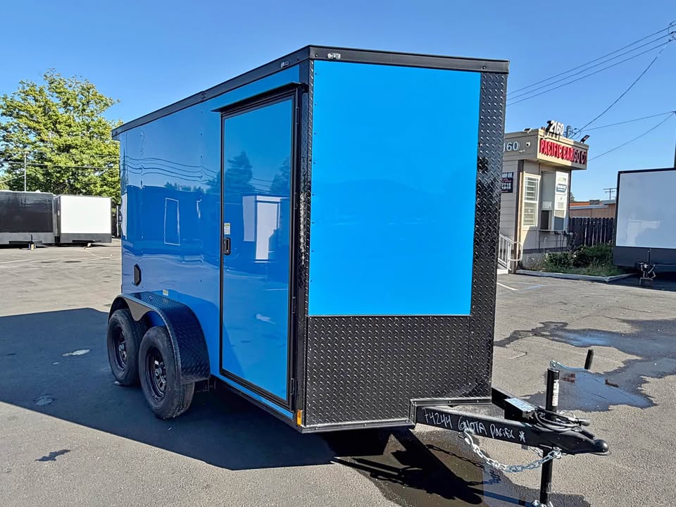 2026 Enclosed Cargo Utility Trailer 6x10ta trailer plus wall etrack